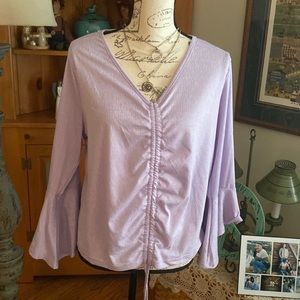 Very cute top! Purchased from a boutique, never worn.